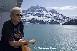 Mom, at the balcony, enjoying Glacier Bay