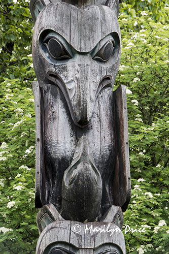 Big raven instructing little raven, totem pole detail, Totem Park, Wrangell, AK