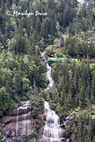 White Pass train crosses the bridge over Pitchfork Falls, on the road to White Pass, Skagway, AK