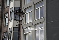 Lamppost seen on the canal cruise, Amsterdam, Netherlands