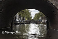 View up a side canal seen on the canal cruise, Amsterdam, Netherlands