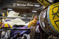 Gluing on individual petals, Float construction barn, Los Angeles, CA