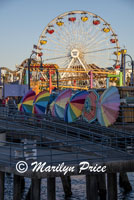 Umbrellas and ferris wheel, Santa Monica Pier, Santa Monica, CA