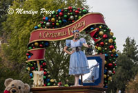 Music box ballerina, teddy bear, and books, Parade on Main Street, Disneyland Park, Anaheim, CA