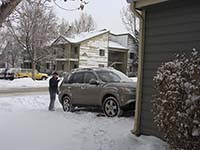 A snow covered car, Westminster, CO