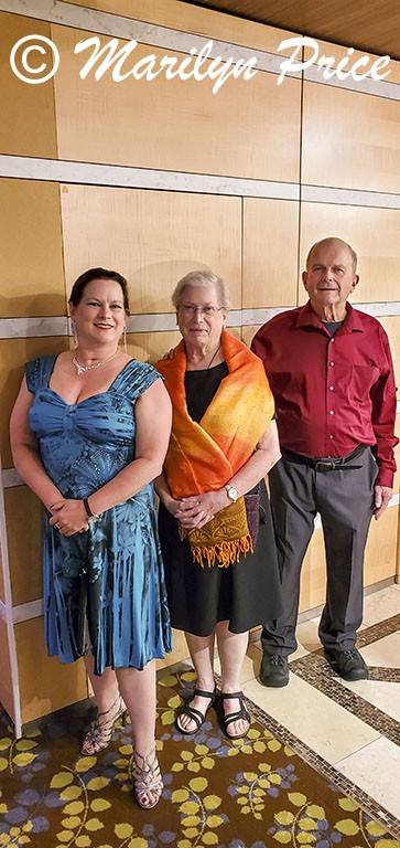 Kelly, Marilyn, and Carl get dressed up for dinner, off the coast of OR