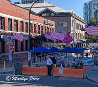 Street patio with imaginative pool floats overhead, Vancouver, BC, Canada