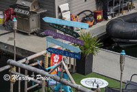 Signpost near houseboats, Granville Island, Vancouver, BC, Canada