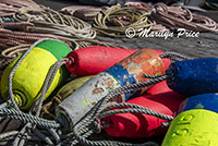 Fishing buoys piled on the dock, Astoria, OR