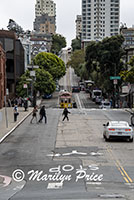 Looking up one of the streets of San Francisco with model cable car, San Francisco, CA