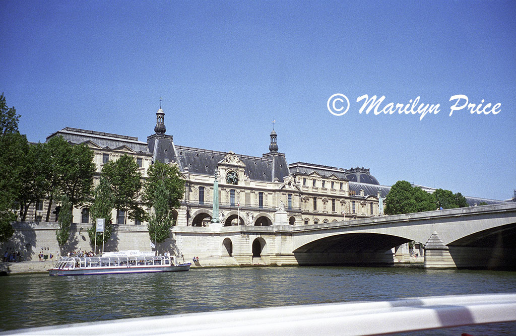 Old buildings as seen from a sightseeing boat on the Seine, Paris, France