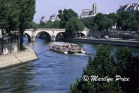 A tour boat on the Seine near Notre Dame, Paris, France