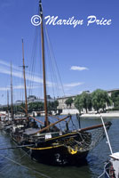 A sailboat moored on the banks of the Seine, Paris, France