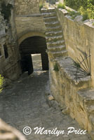 Cobbled street and arched passageway, Les Baux, France