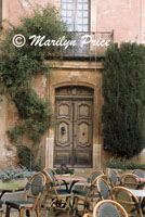 Door at a sidewalk cafe, Rousillon, France