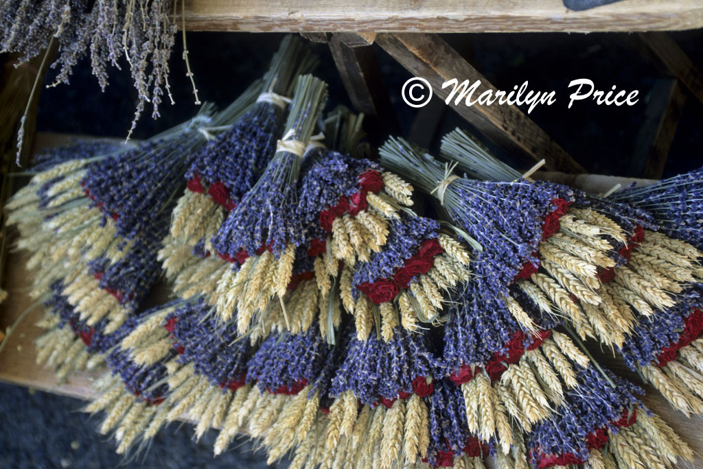 Dried lavendar, roses, and wheat at market, L'Isle sur la Sorque, France