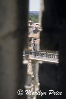 Looking at a griffin through an arrow slit near the top of the Palais des Papes, Avignon, France