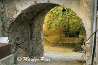 Arched entrance to a courtyard, Menerbes, France