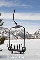 Antique chair lift and the Rocky Mountains near Frisco, CO