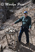 Carl places a rock on the cairn for luck, North Kaibab Trail, Grand Canyon National Park, AZ