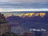 The sun breaks through the overcast, Village rim area, Grand Canyon National Park, AZ