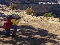 Marilyn shooting balanced rocks at Hopi Point, Grand Canyon National Park, AZ