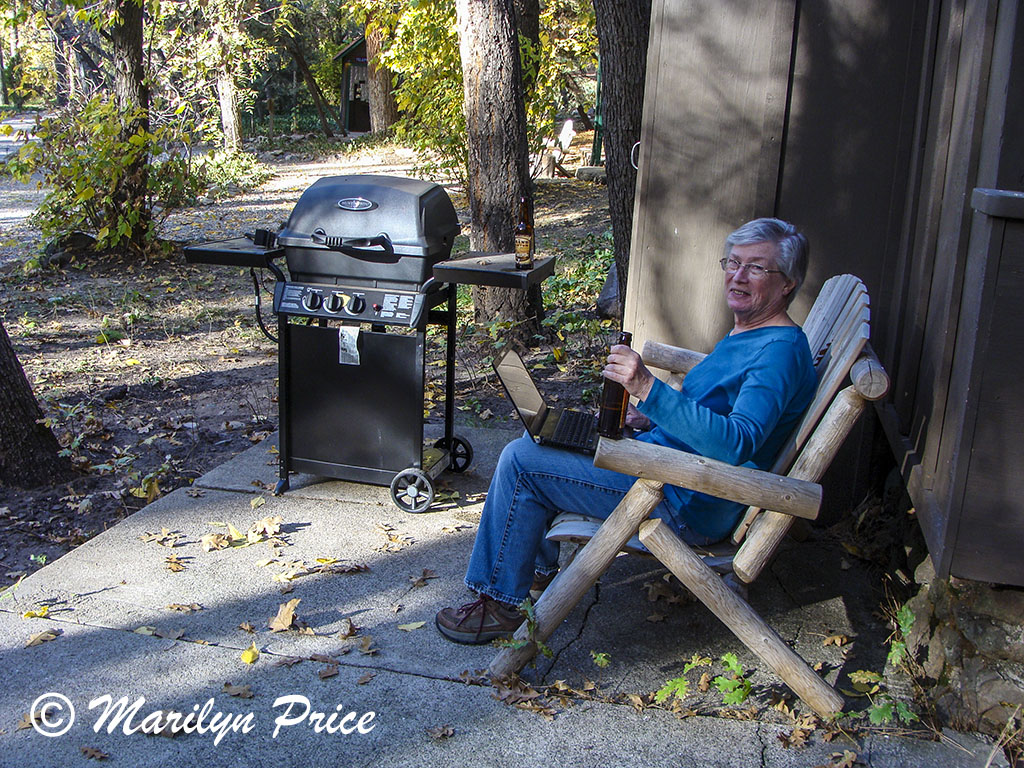 Marilyn, online and beer in hand, Oak Creek Canyon, AZ