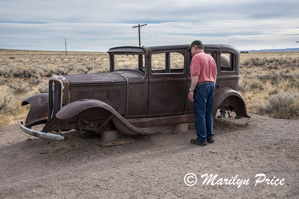 Carl looks at 1932 Studebaker on old Route 66, Petrified Forest National Park, AZ