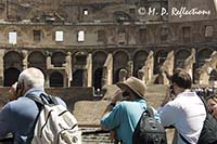 Carl listens to tour guide, Colosseum, Rome, Italy