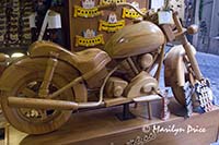 Wooden motorcycle in a toy store, Rome, Italy