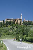 A couple of hardy bicyclists near Pienza, Tuscany, Italy