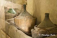 Old wine bottles and ghost, Tuscany, Italy