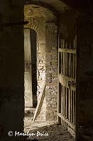 Interior door of abandoned farm house, Tuscany, Italy