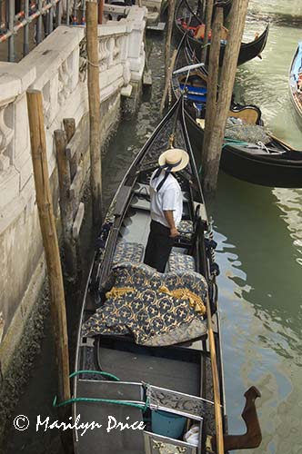 Gondola and gondolier, Venice, Italy