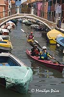 Kayakers in a canal, Burano, Italy