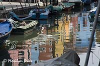 Reflections in a canal, Burano, Italy