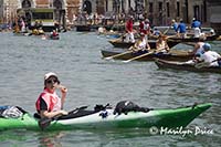 Grand Canal and parade of rowed boats, Venice, Italy