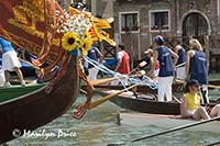 Grand Canal and parade of rowed boats, Venice, Italy