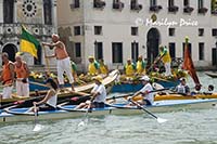 Grand Canal and parade of rowed boats, Venice, Italy