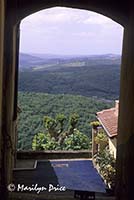 Countryside through an archway, Radda in Chianti, Italy