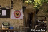 Cafe entrance with Black Rooster sign, San Sano, Italy