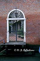 Gate to a private courtyard, Venice, Italy