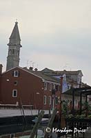 A leaning bell tower, Burano, Italy