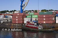 Tugboat assists a container ship, Portland, ME