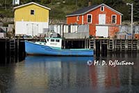 Fishing boat, buildings, and wharf, Northwest Cove, Nova Scotia