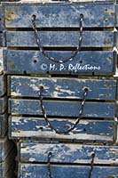 Wooden boxes stacked on a wharf