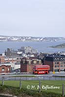 A double decker tourist bus approaches the Citadel, Halifax, Nova Scotia