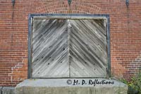 Door on a delivery dock at an old mill, Newmarket, NH