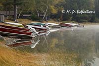 Boats pulled onto the shore, Nahmakanta Lake, ME