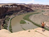 Jenny looks at the Colorado River from butte, near Moab, UT